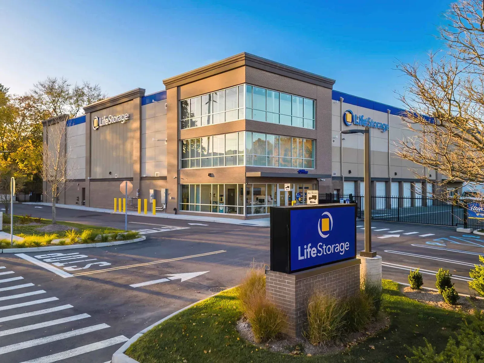Life Storage building exterior and monument sign at golden hour in Glen Head, New York, commercial real estate photography, by OpenDoors360