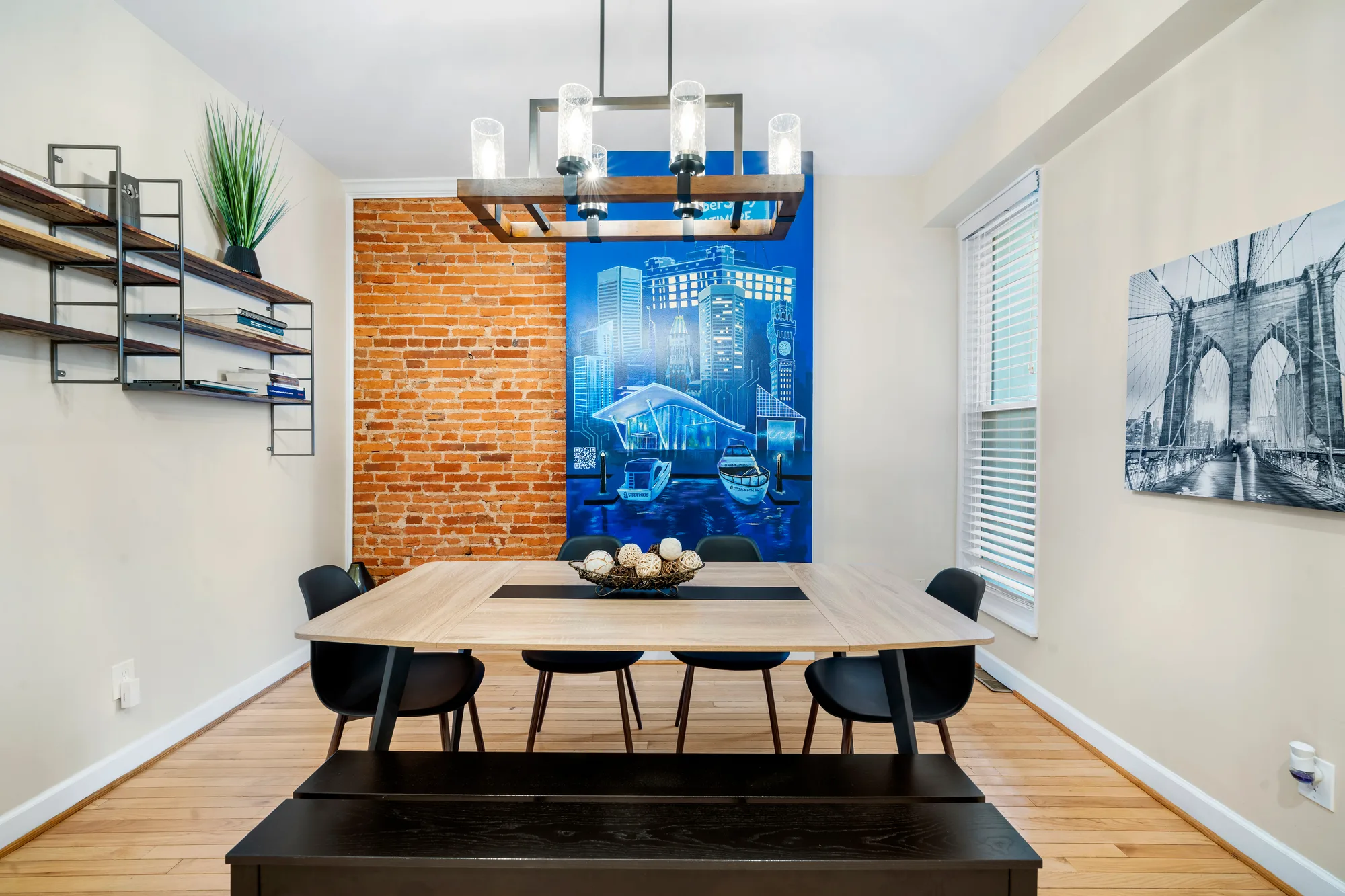 OpenDoors360 professional real estate photography of a staged dining room with exposed brick, capturing the space from the right angle in natural light