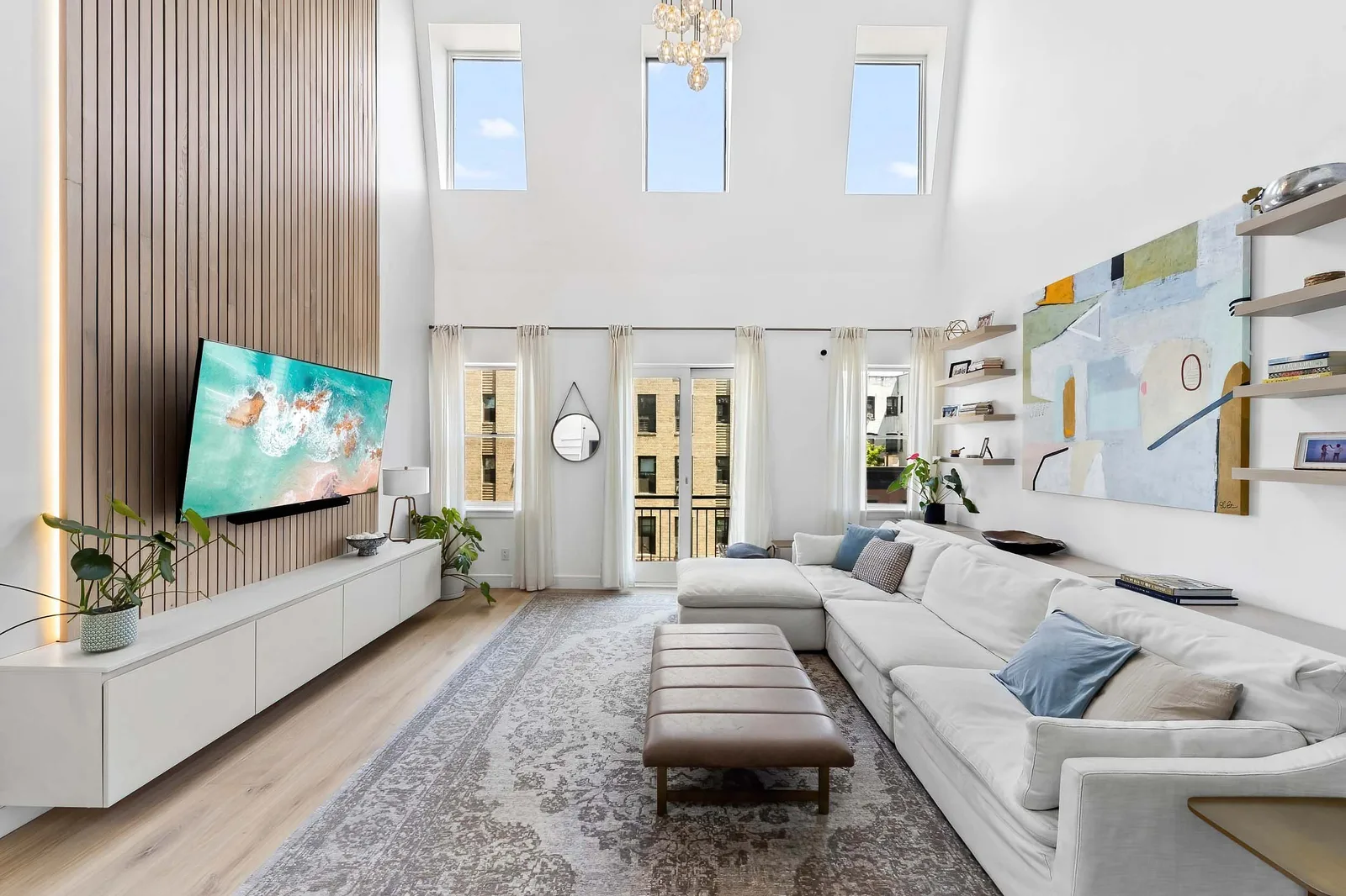 High-ceiling living room with HDR real estate photography for a Bronx apartment listing in New York City