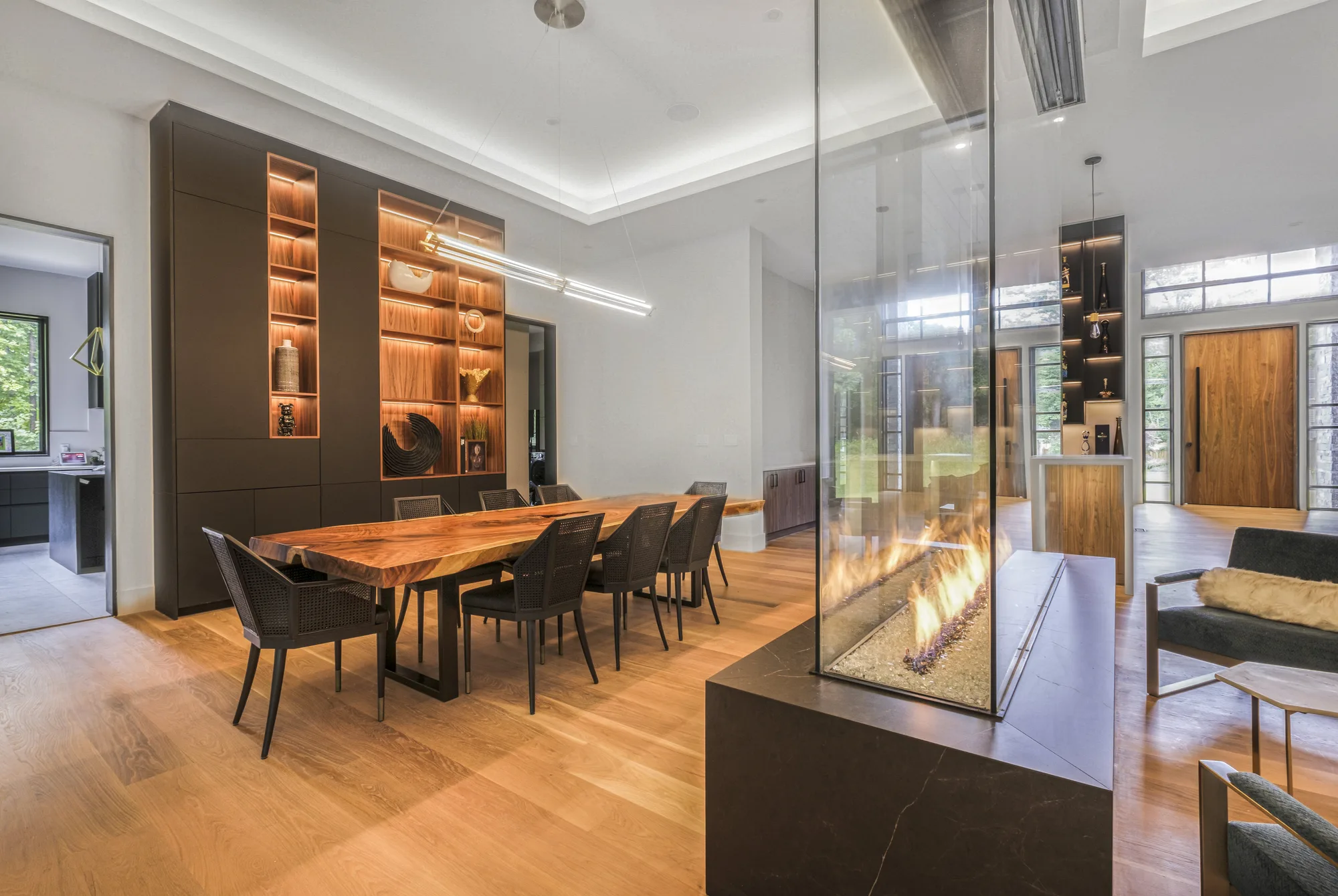 Modern dining room with a fireplace shot for a 360 virtual tour, the kind of interactive walkthrough that markets a space on Google Maps