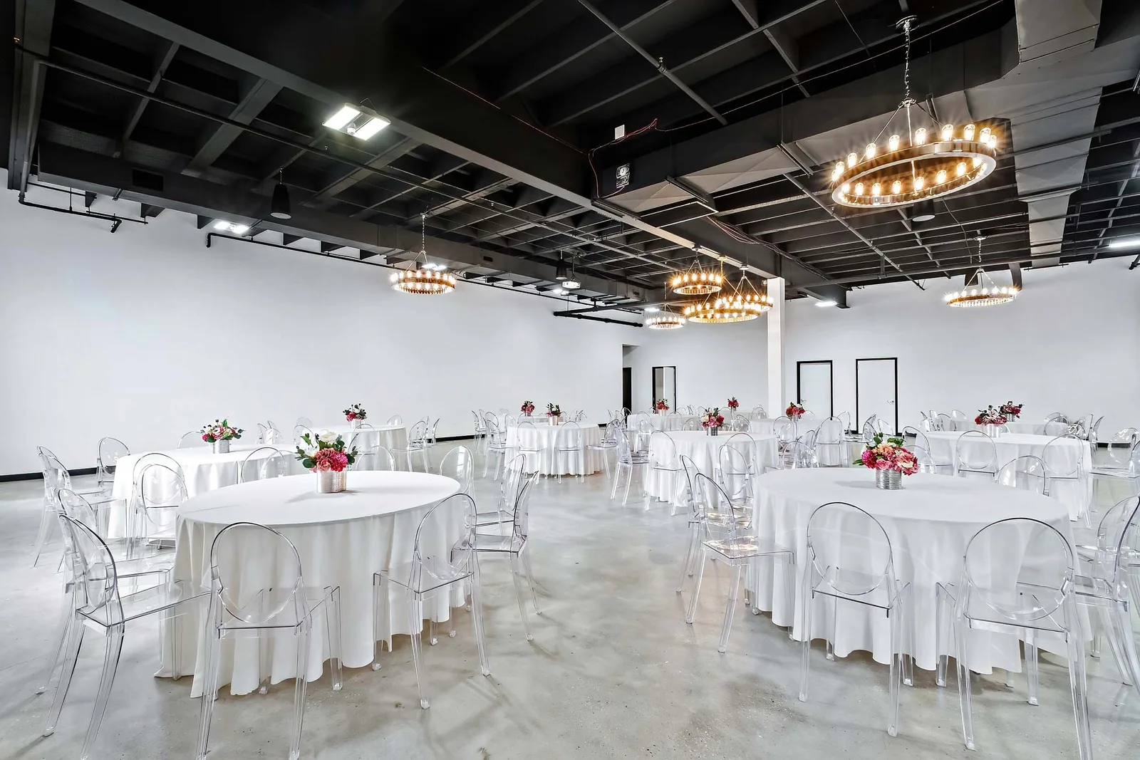 Event venue set with round tables and chandeliers, captured for a 360 virtual tour that lets potential customers explore the floor before they book