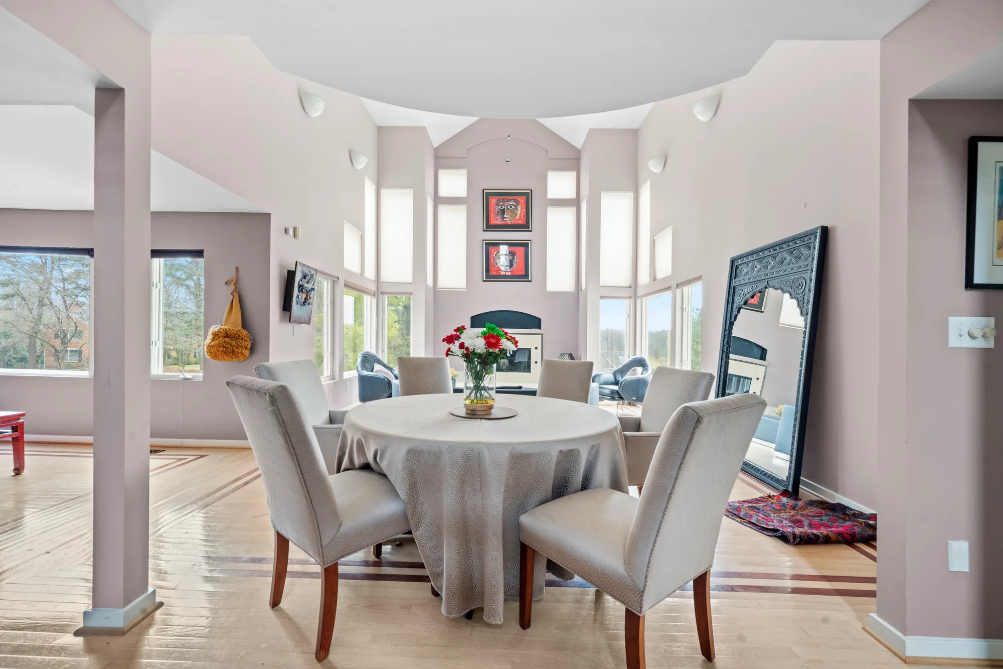 Open dining area with tall windows and natural light, real estate photography for a larger Staten Island home built to support listing marketing across MLS and social media